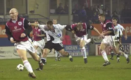 Andrew Fotiadis has his shirt pulled