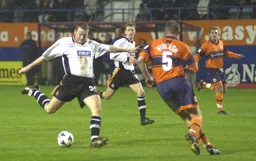 Steve Howard about to let fly at the Reading goal