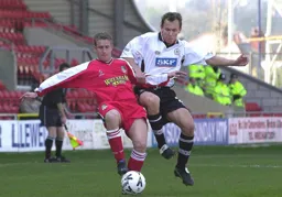 Paul Shepherd tussles for the ball