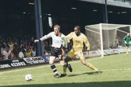 Lee Mansell under pressure from Sagi Burton - Godwin