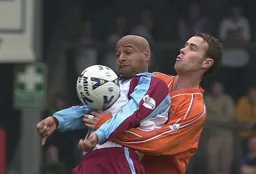 Ian Hillier gives close attention to a Scunthorpe forward