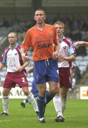 Russell Perrett drifts into the box