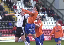 Jean-Louis Valois tries to win a header