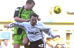 Gary McSwegan loses an aerial battle on his debut