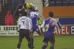 Chris Coyne heads in the Town's second goal