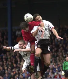 Chris Coyne gets an elbow for his troubles