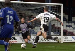 Steve Howard deftly chips the goalkeeper for the third goal