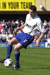 Chris Coyne plays a simple pass