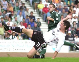 Steve Robinson challenging for the ball