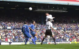 Matthew Spring rises up to head the ball