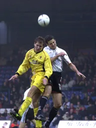 Chris Coyne jumps for the ball