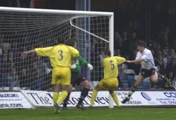 Tony Thorpe watches the ball go towards goal