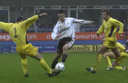 Matthew Spring jinks passed the defender