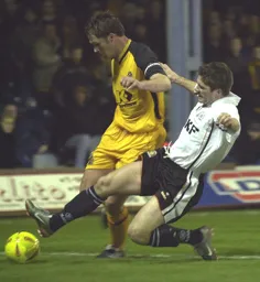 Tony Thorpe putting in a strong tackle