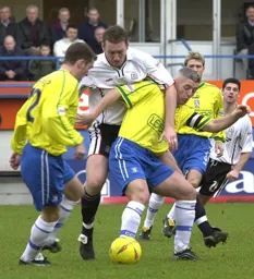 Steve Howard grapples for the ball