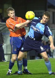 Lee Mansell battling for possession