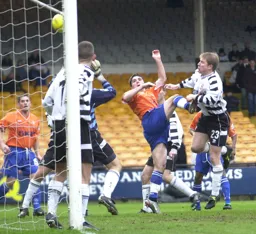 Tony Thorpe heads goalwards