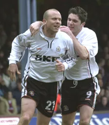 Paul Hughes and Tony Thorpe celebrate