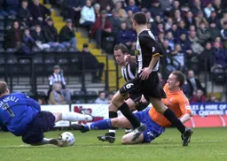 Steve Howard tries to beat the keeper