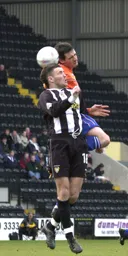 Matthew Spring jumps for the ball