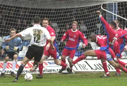 Chris Coyne taking on the Huddersfield defence