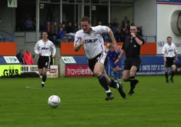 Steve Howard about to be pulled back