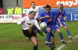 Carl Griffiths controls the ball