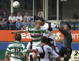 Rob Beckwith punches the ball clear