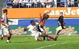 Penalty. Dean Crowe is brought down by Simon Ford