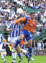 Dean Crowe gives a defender an uncomfortable time