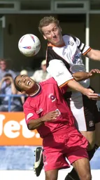 Always dangerous in the air Steve Howard gets above Chris Westwood