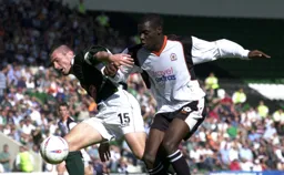 Paul Wotton feels the full force of Enoch Showunmi`s challenge