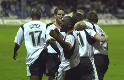Adrian Forbes looks happy celebrating Kevin Foley`s goal