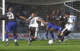 Matt Spring facing up to a wall of Rangers defenders