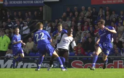 Courtney Pitt is surrounded by Oldham defenders