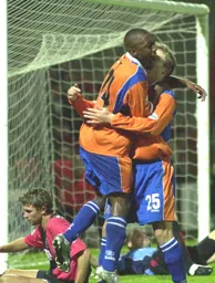 Steve Purches on the ground has just put through his own goal for Town`s first goal