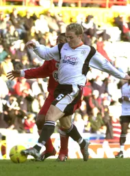 Gary McSheffrey brushes off a defenders challenge