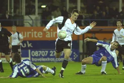 Matt Spring dances his way through the defence leaving Terry Bowes flat on his back