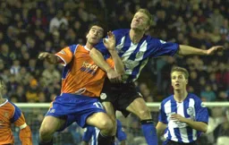 Steve Robinson mixes it with Dean Smith