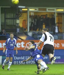 Steve Howard heads in the only goal of the game