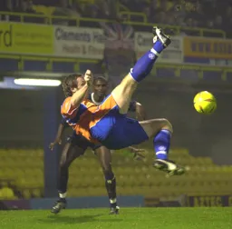 Steve Howard attempts an overhead kick