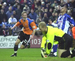 Lee Mansell looks happy after scoring his goal