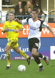 Michael Leary moves forward with the ball