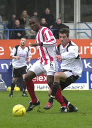 Michael Leary tries to get the better of Ibrahim Sonko