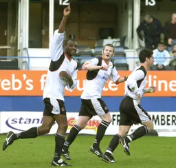 Emmerson Boyce looks happy after scoring Town`s first goal
