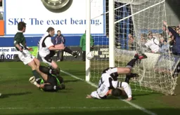Chris Coyne tumbles to the ground after scoring Town`s goal