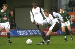 Peter Holmes takes a shot at goal