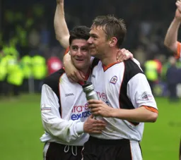 Happy Hatters Steve Robinson and Sol Davis after the final whistle