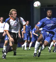 Paul Underwood in a chase for the ball