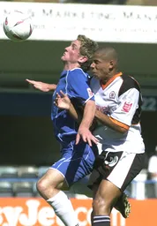 Curtis Davies heads clear